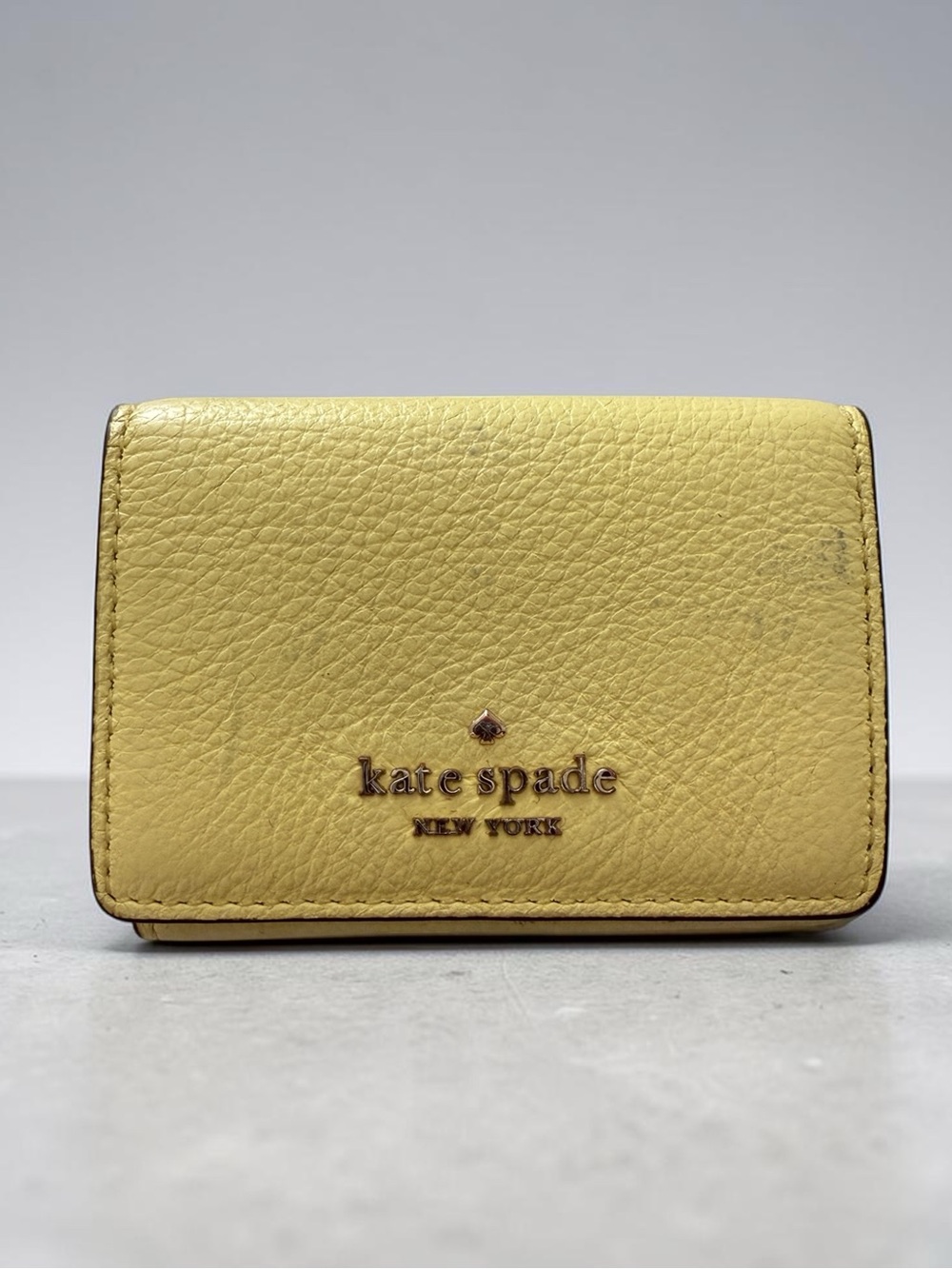 kate spade Yellow Pebbled Leather Fold Wallet